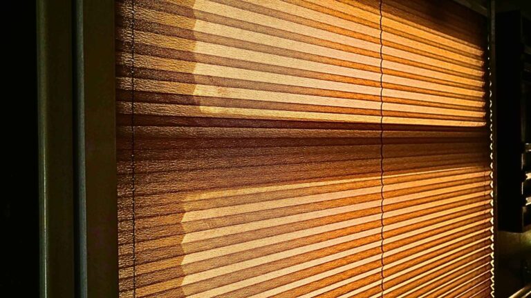 Picture of blinds drawn to make the room dark to signify financial time blindness.